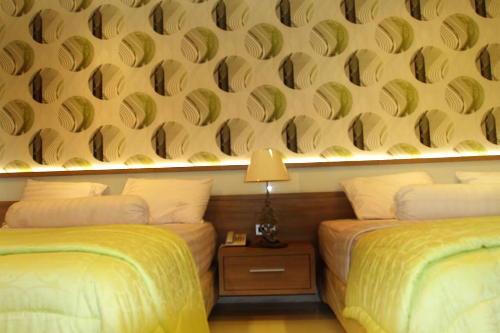 Aquarium Hotel Pangandaran Rum bild